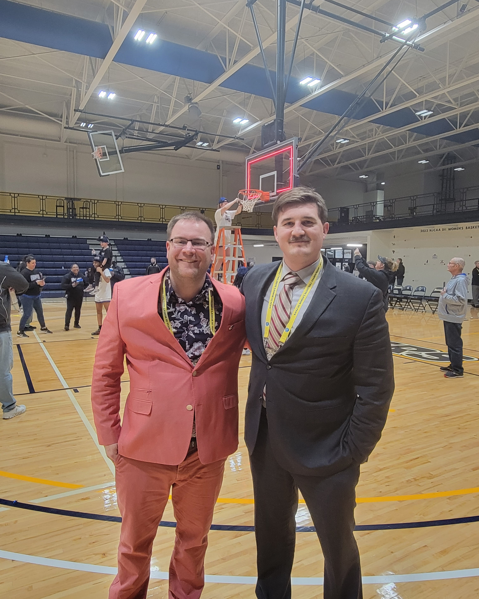 Tim Clagg and his broadcast partner at the NJCAA DII Women's Basketball Championship net cutting