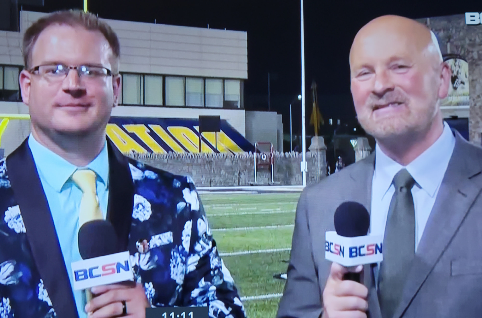 Tim Clagg on camera with his broadcast partner during a live football pregame hit