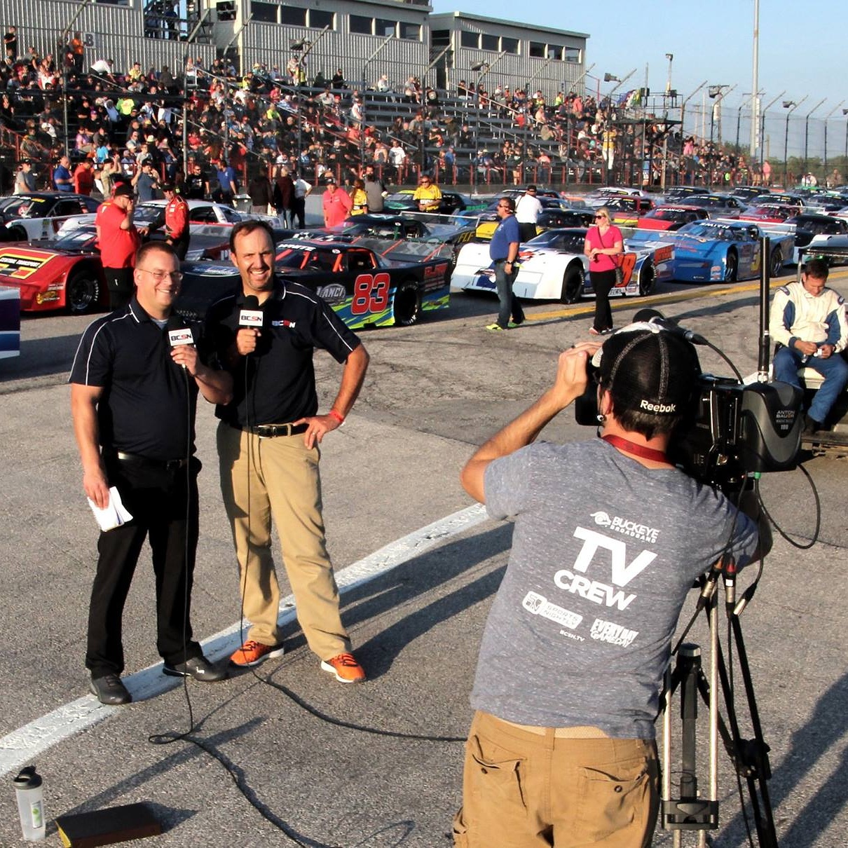 Tim Clagg on the grid with a BCSN broadcast partner before a short-track race